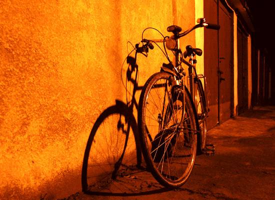Bicycle in a dark alley