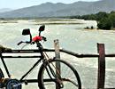 Bicycle, lake and mountains